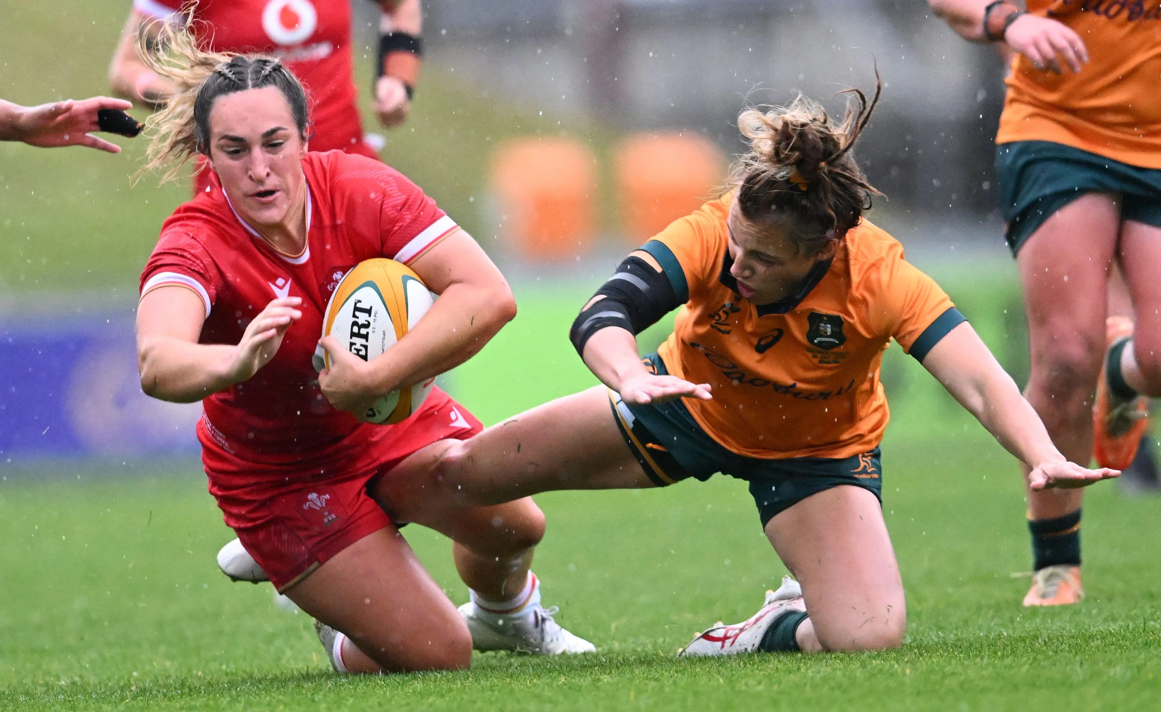 Courtney Keight (left) of Wales in action during the First Women's Test Match between the Australian Wallaroos and Wales. Pic. Alamy