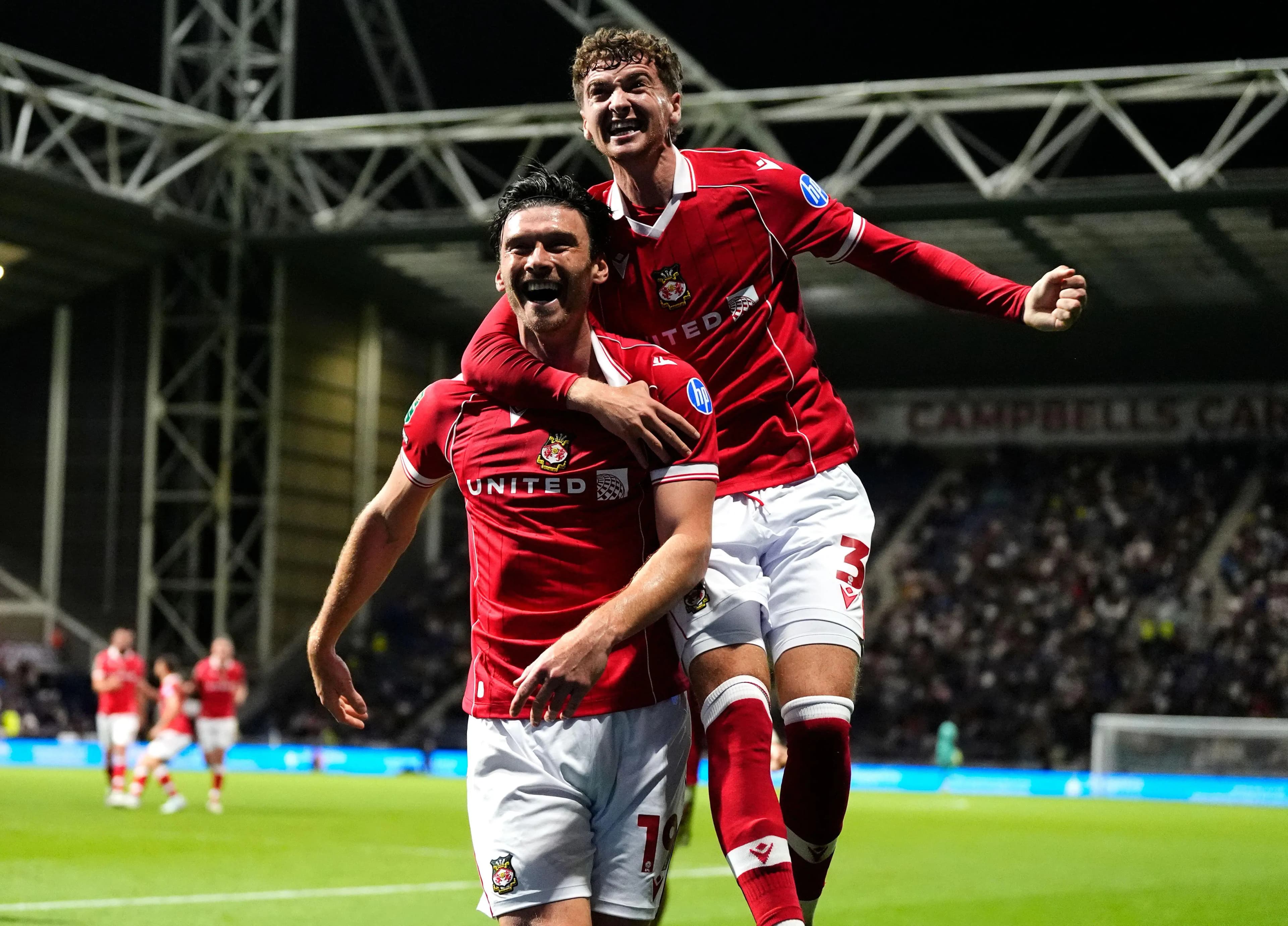 Wrexham's Kieffer Moore (left). Pic. Alamy