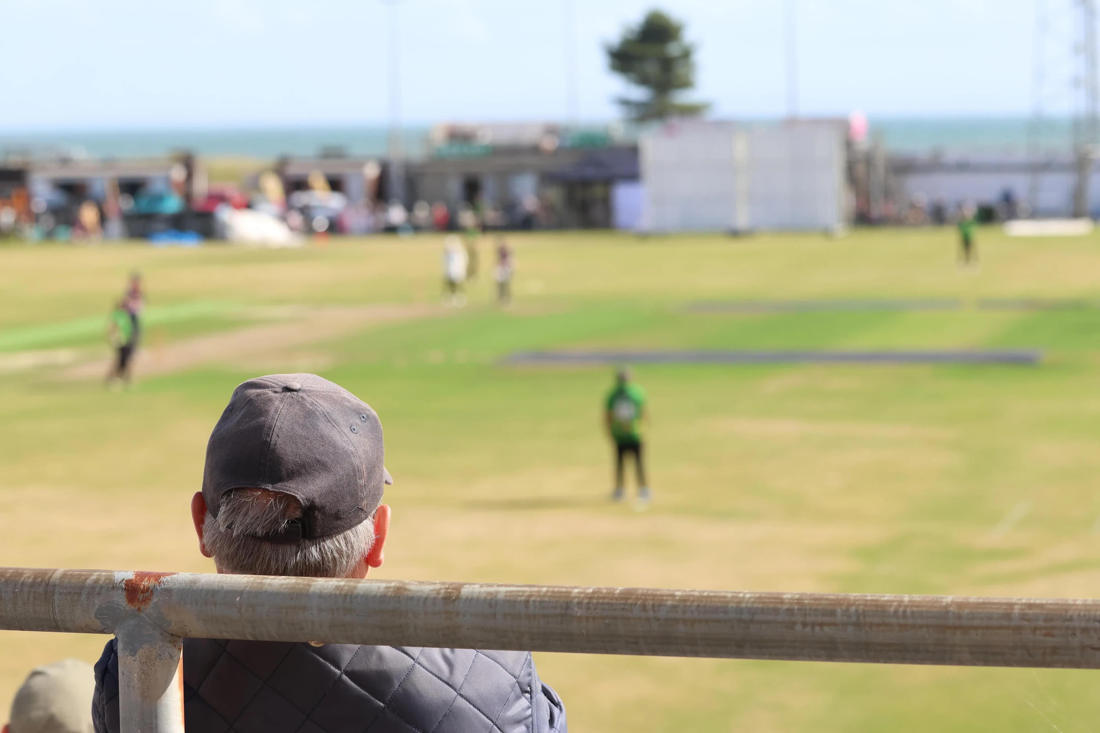 Cricket how it used to be - a spectator watches the final cricket match at St Helen's. Pic. Owen Morgan
