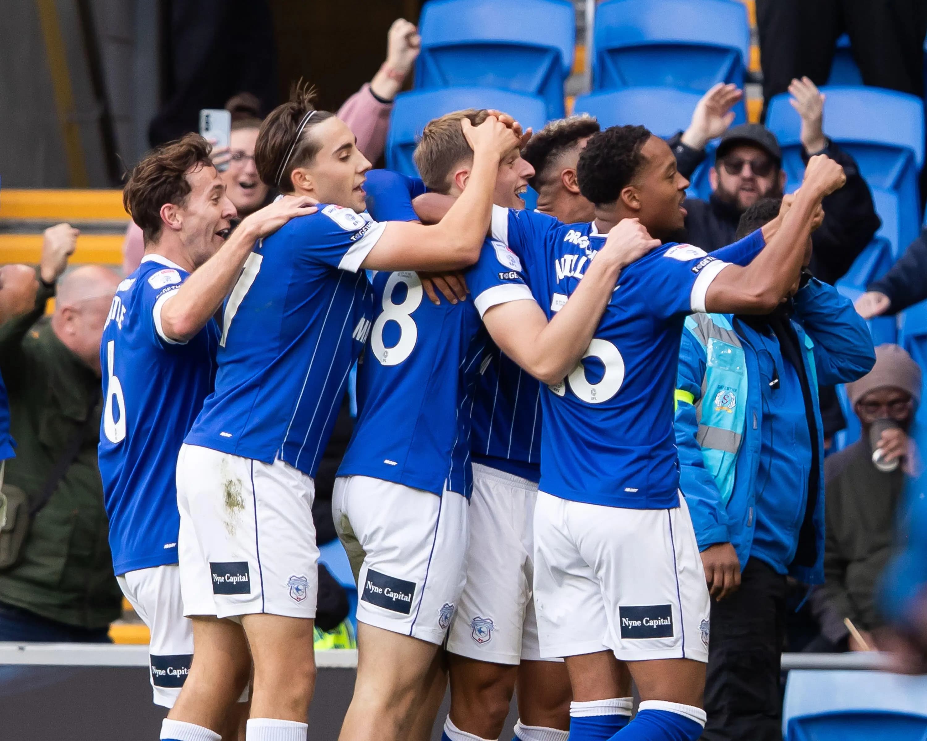 Dylan Lawlor of Cardiff City celebrates with teammates after scoring. Pic. Alamy