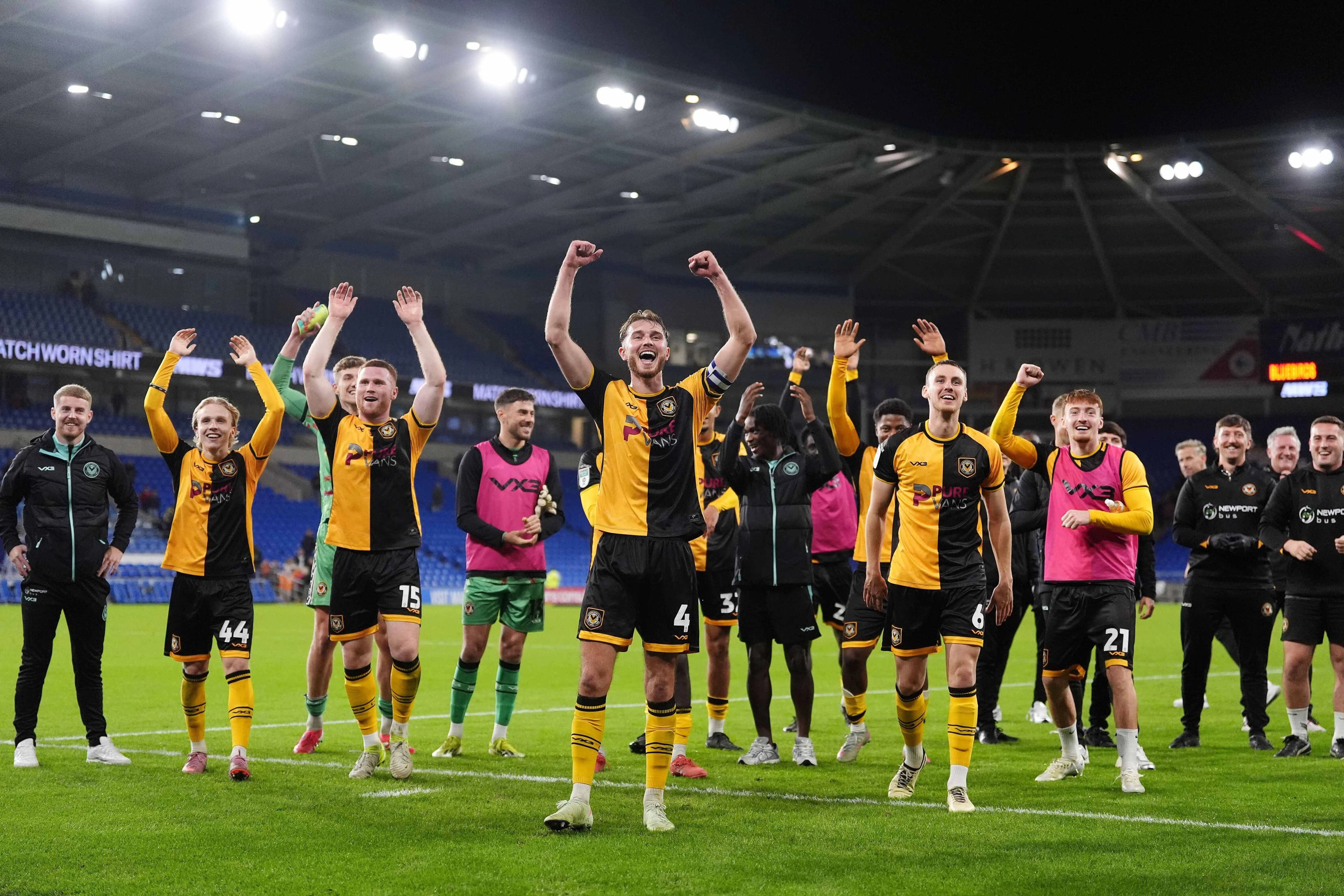 Newport County players celebrate their victory at Cardiff. Pic: Alamy