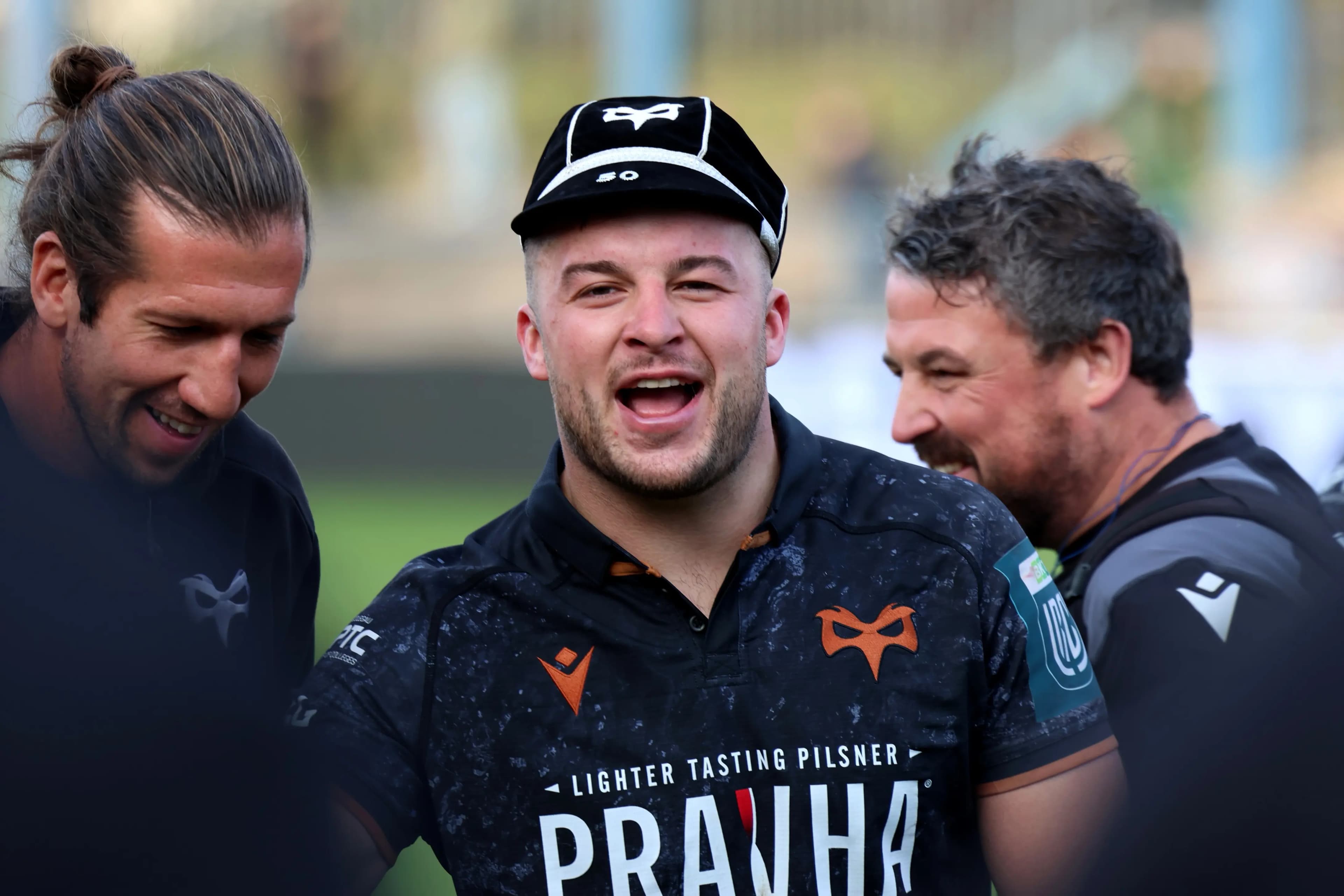 Harri Deaves with his commemorative cap. Pic. Owen Morgan