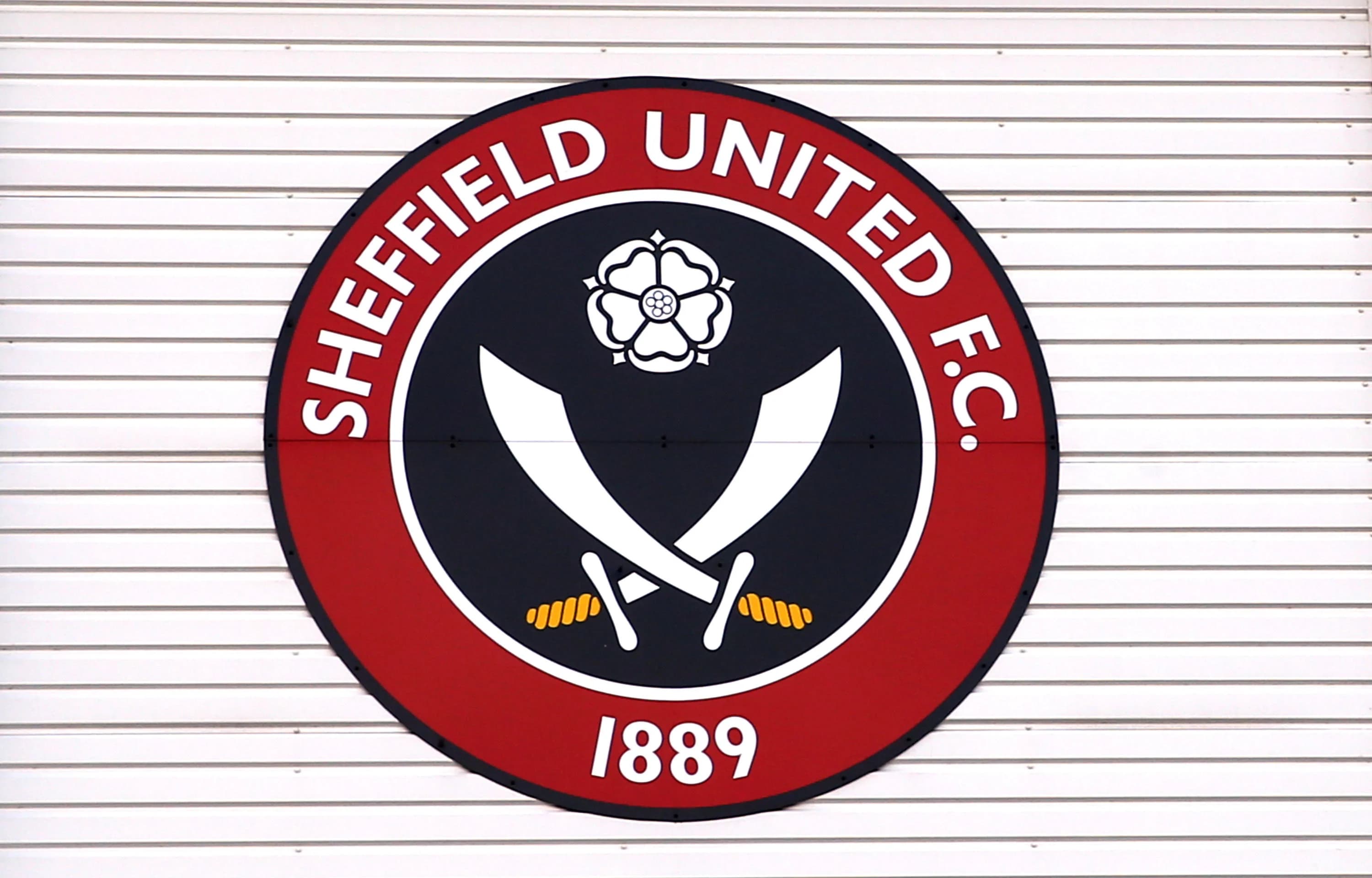 Sheffield United Crest on the wall at Bramall Lane Credit Alamy