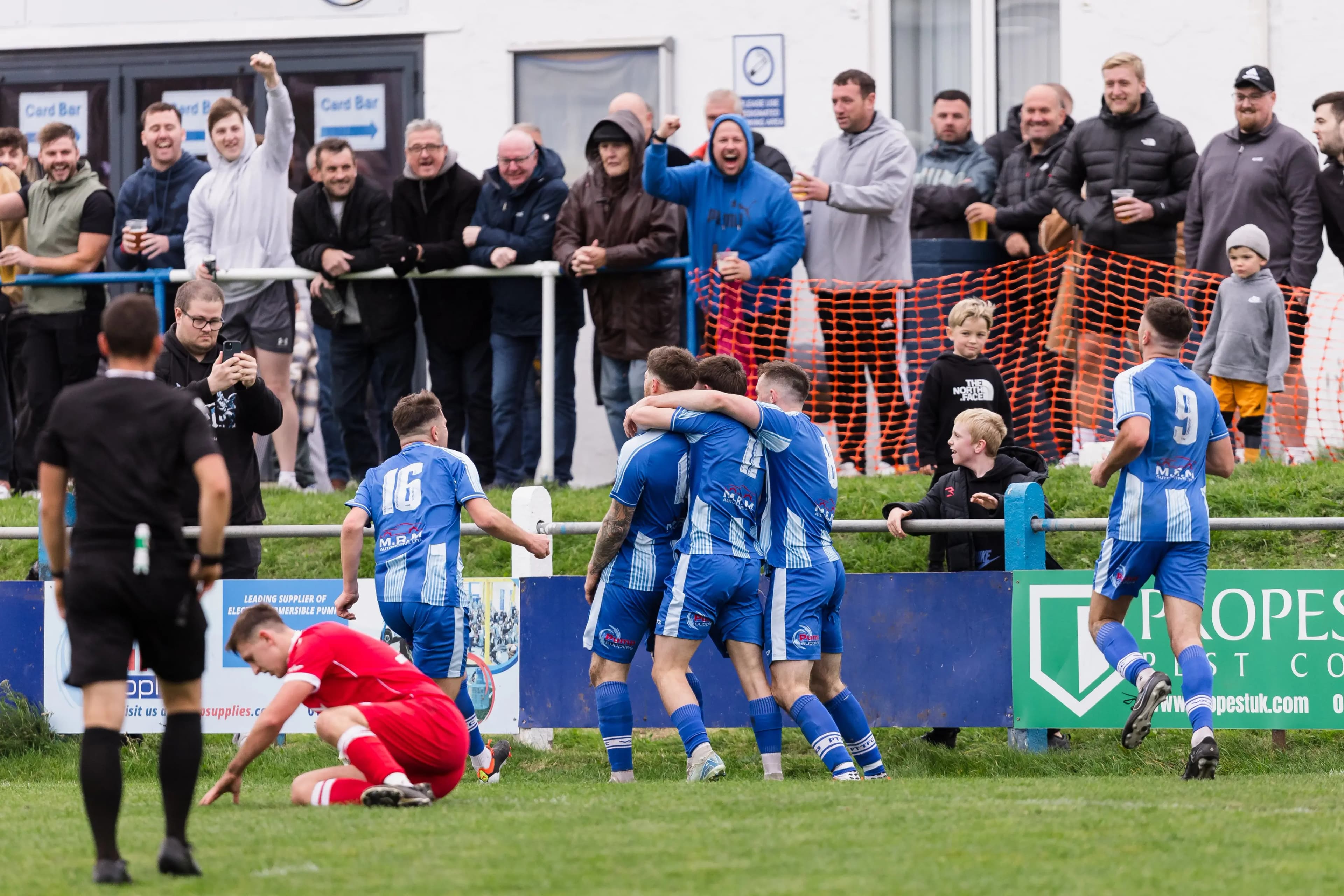 Port Talbot Town players celebrate their third goal in their 3-1 win over Afan Lido. Pic: S4C