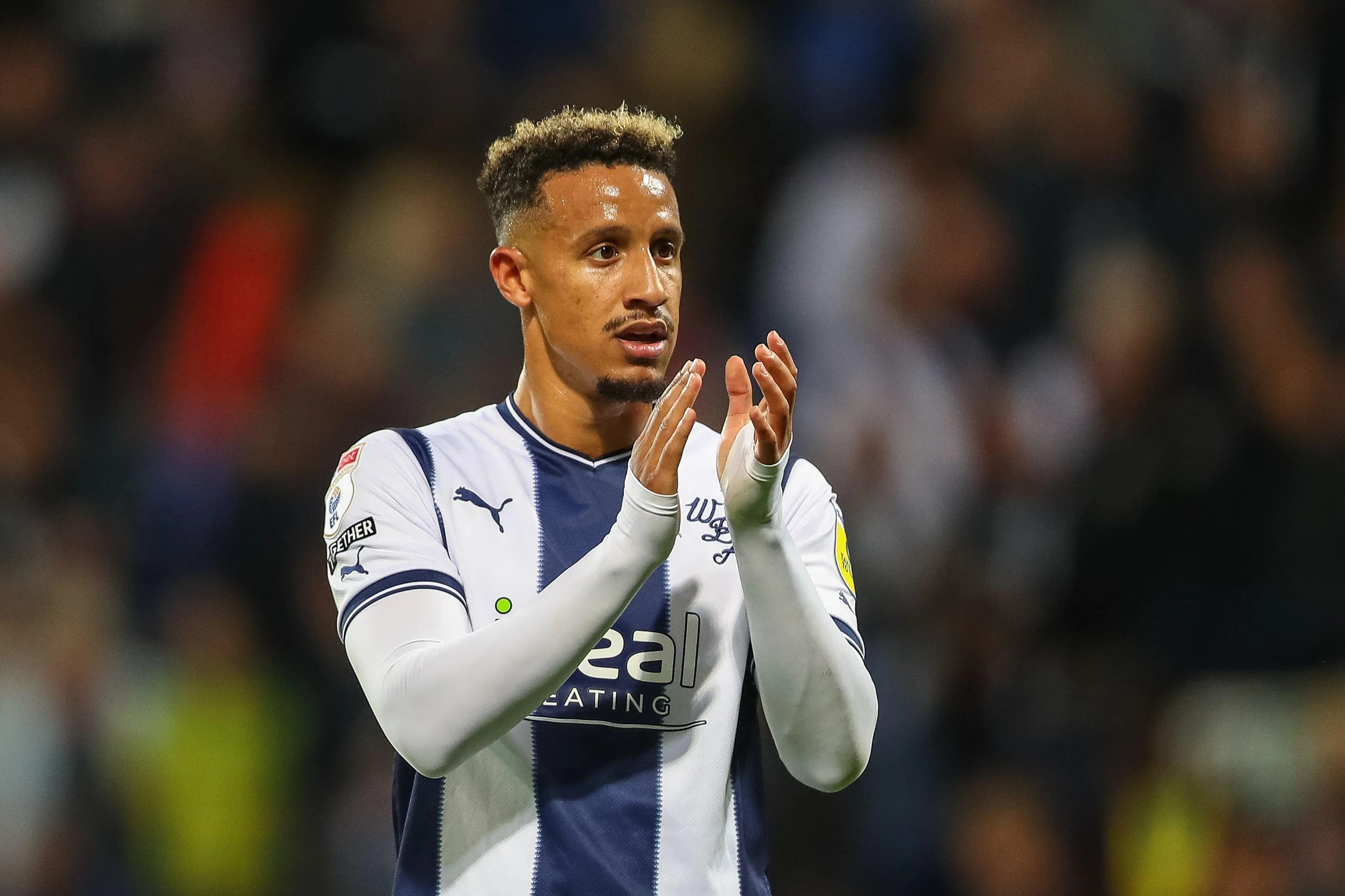 Callum Robinson applauds the fans at full time August 2022 Cr: Alamy