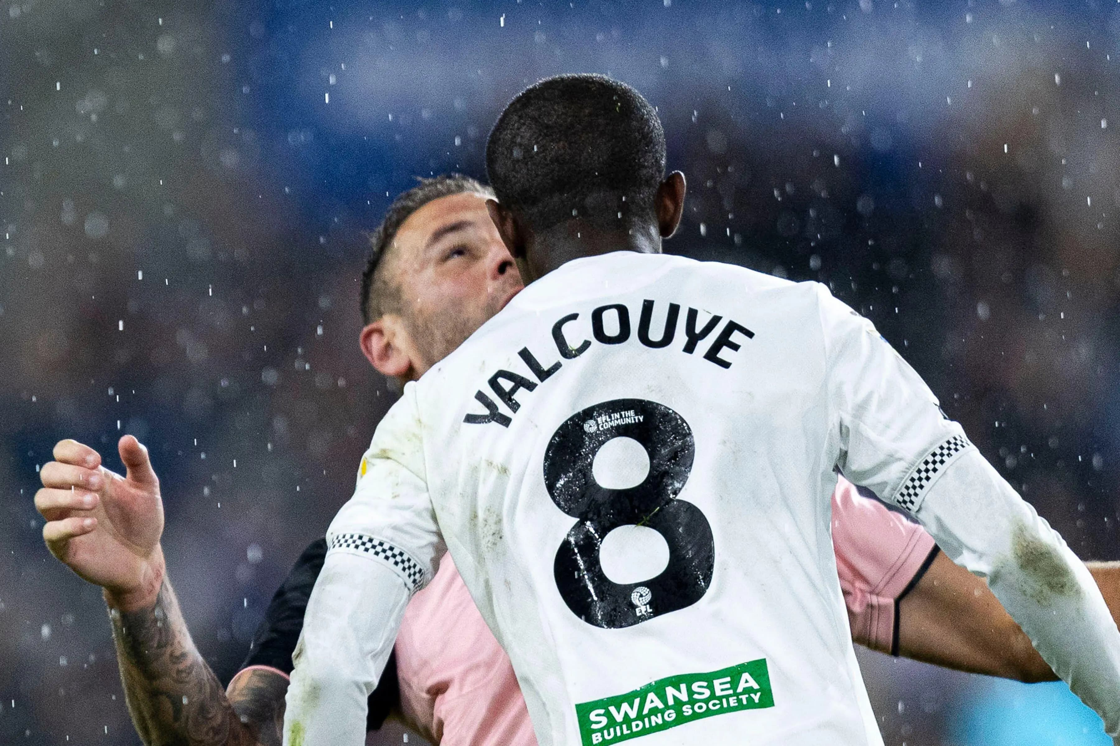 Malick Yalcouye clashes with with QPR Ranger defender Steve Cook.. Pic: Alamy