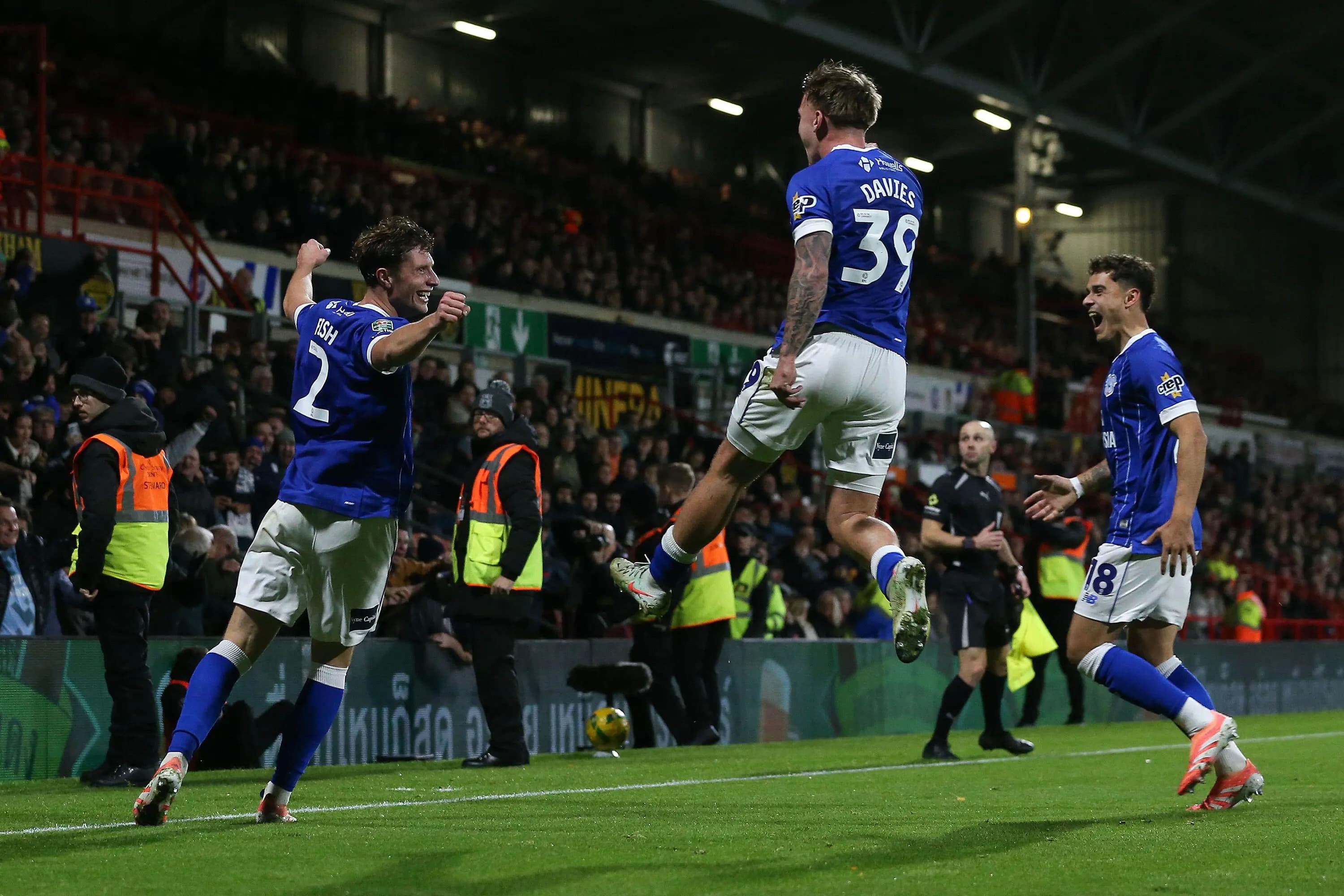 Will Fish of Cardiff City (left) celebrates with his teammates after scoring. Pic: Alamy.