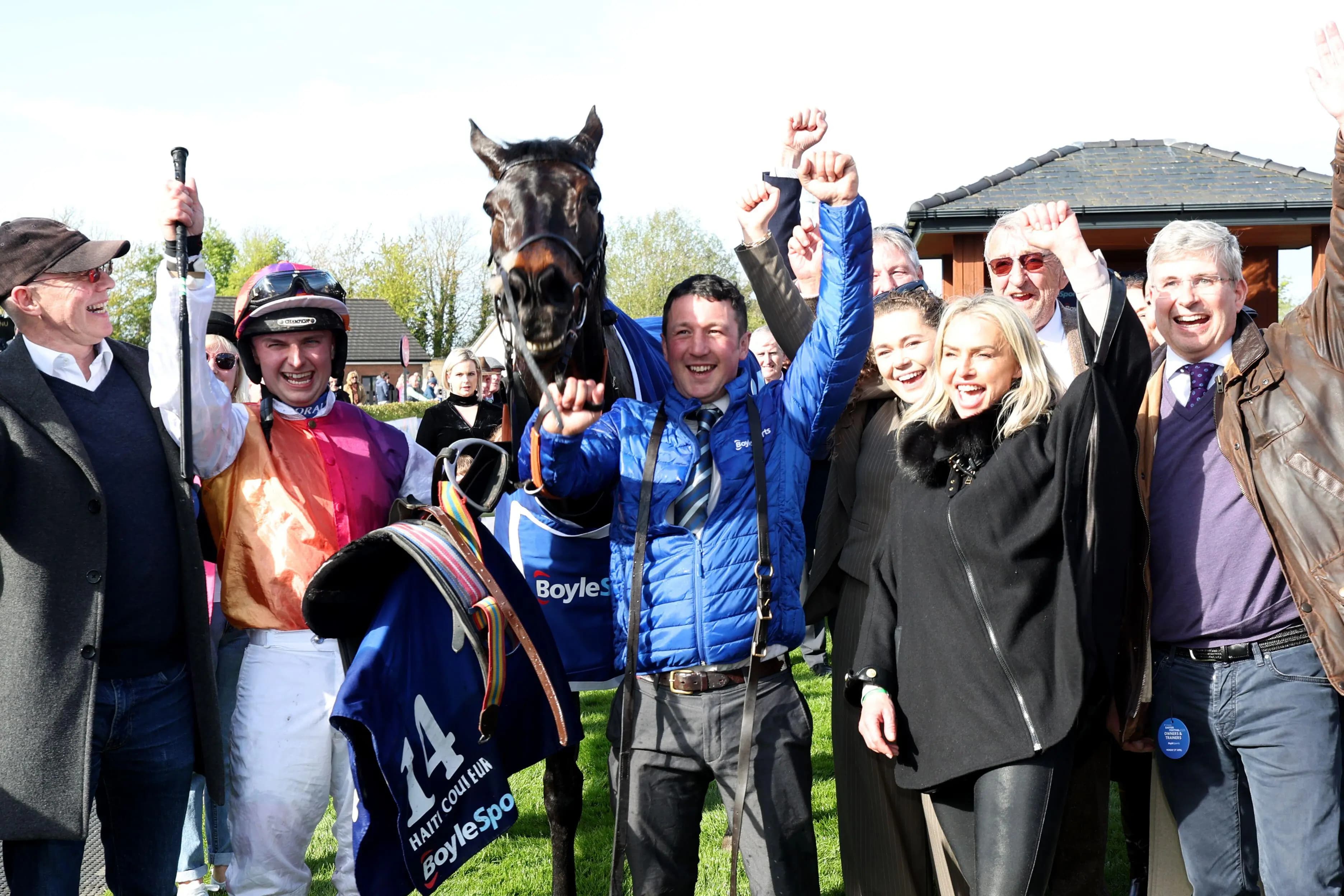 Jockey Sean Bowen and trainer Rebecca Curtis (second right) celebrate with the winning connections after their horse Haiti Couleurs won the Irish Grand National . Pic: Alamy