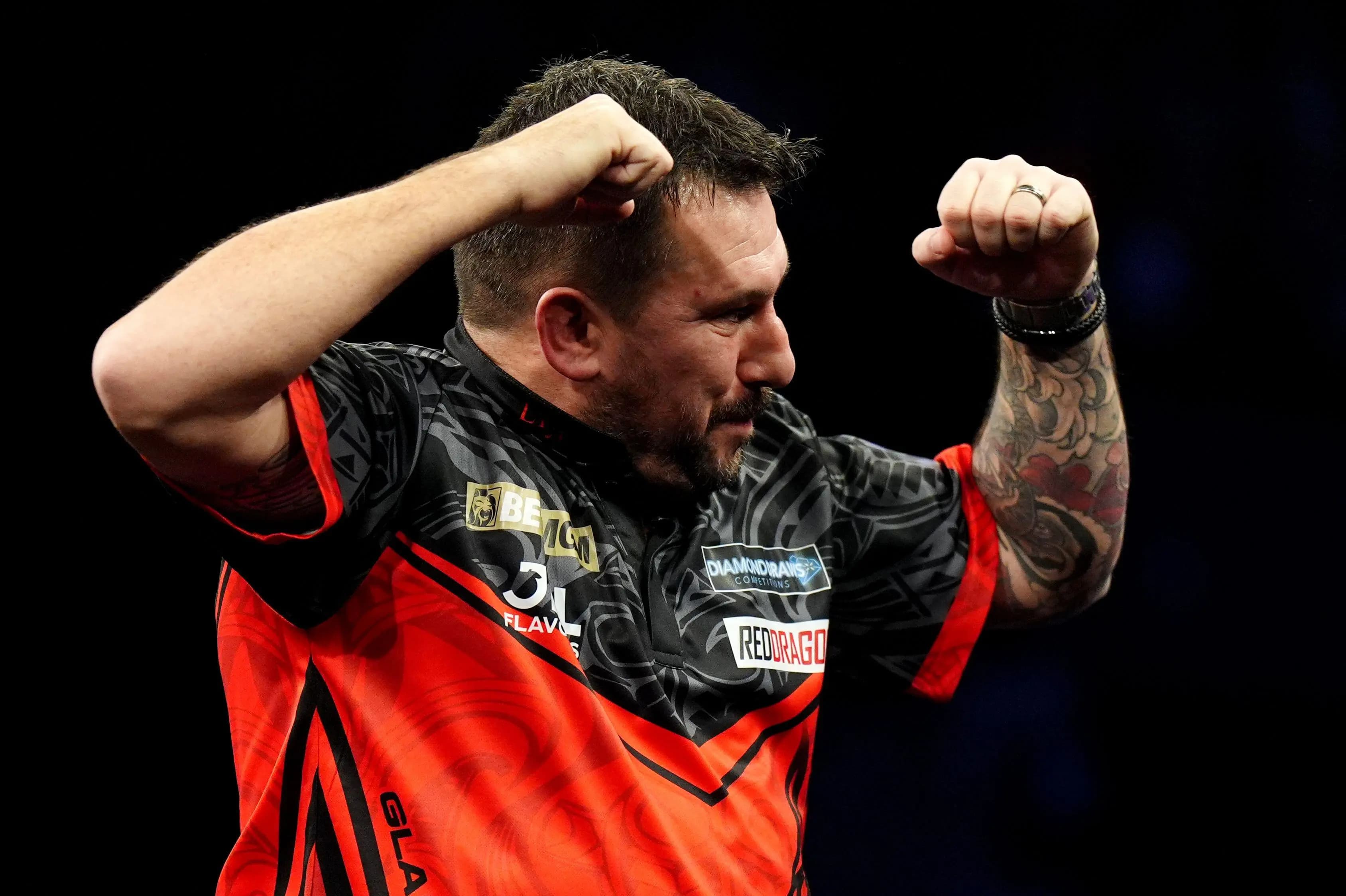 Wales' Jonny Clayton celebrates after winning the final against Netherlands' Gian van Veen. Pic. Alamy