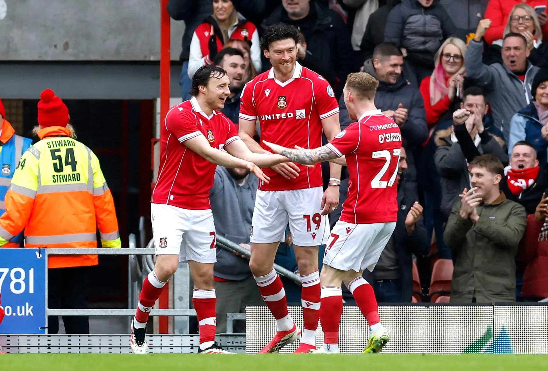 Wrexham's Kieffer Moore (centre). Pic. Alamy