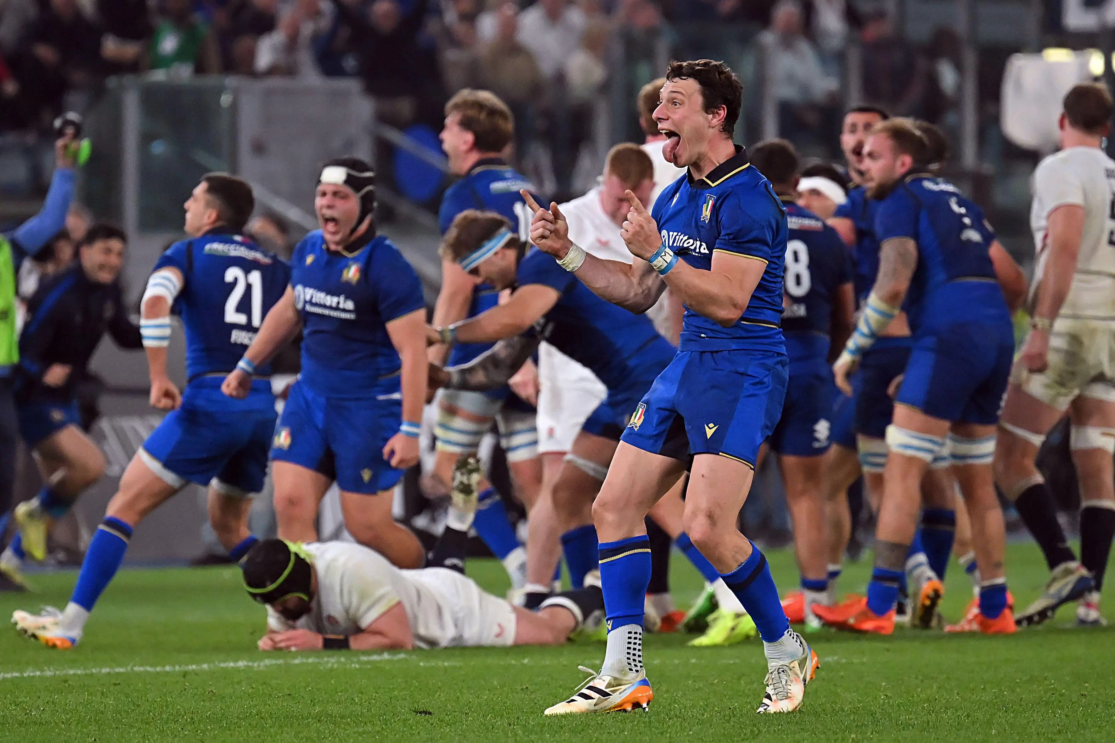 Italy's players celebrate their victory over England. Pic. Alamy