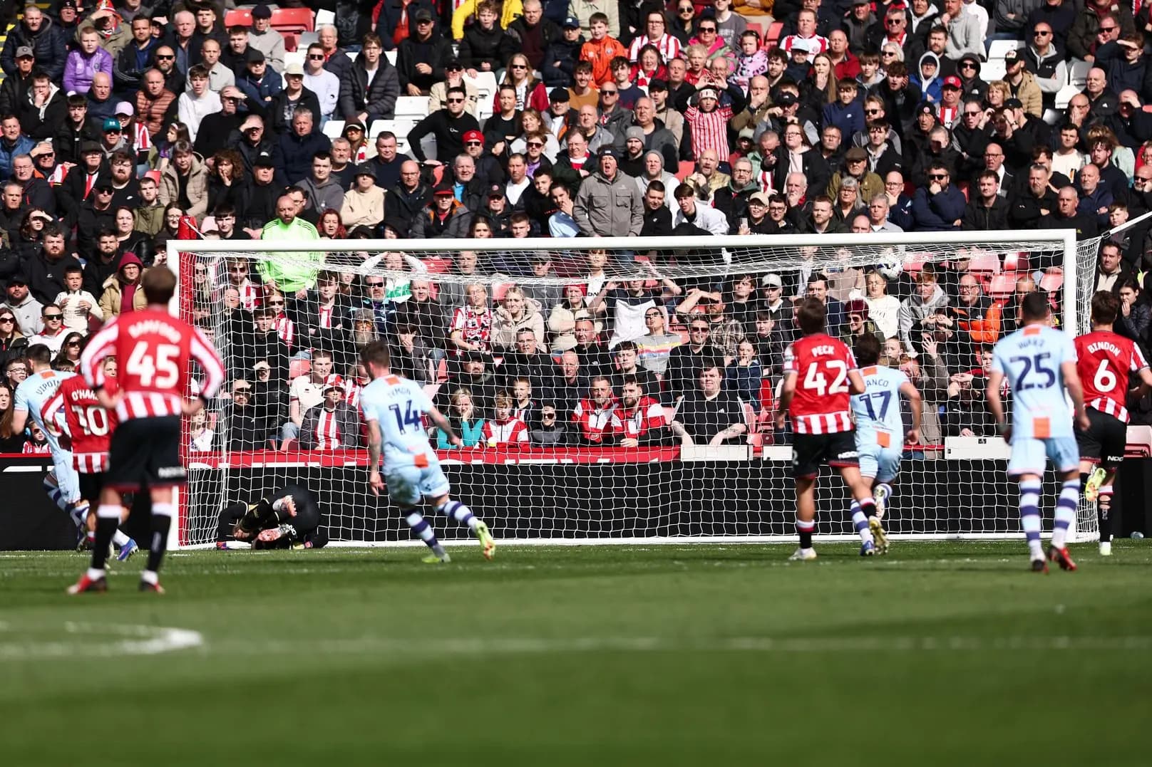 Zan Vipotnik (far left) scores for Swansea City. Pic. Alamy