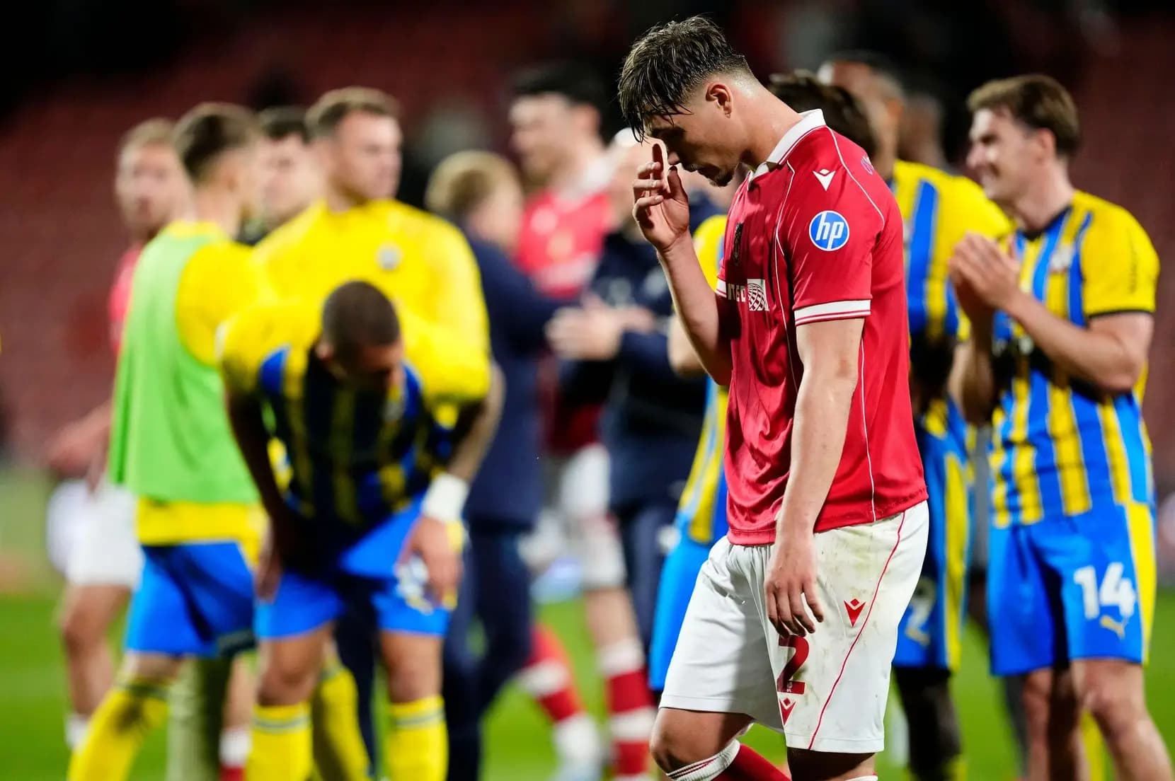 Wrexham's Callum Doyle shows his dejection after defeat to Southampton. Pic: Alamy
