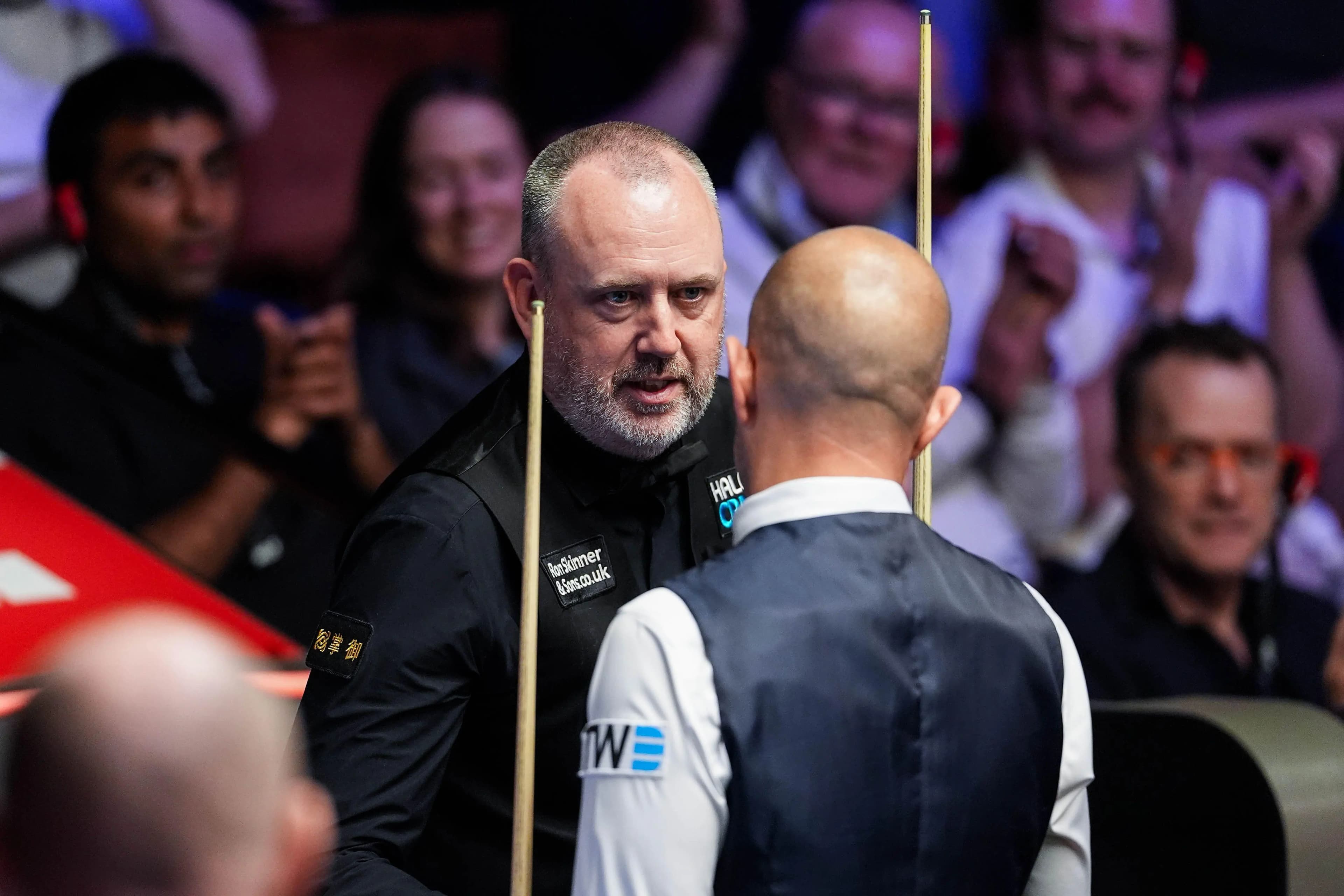 Mark Williams congratulates Barry Hawkins. Pic: Alamy