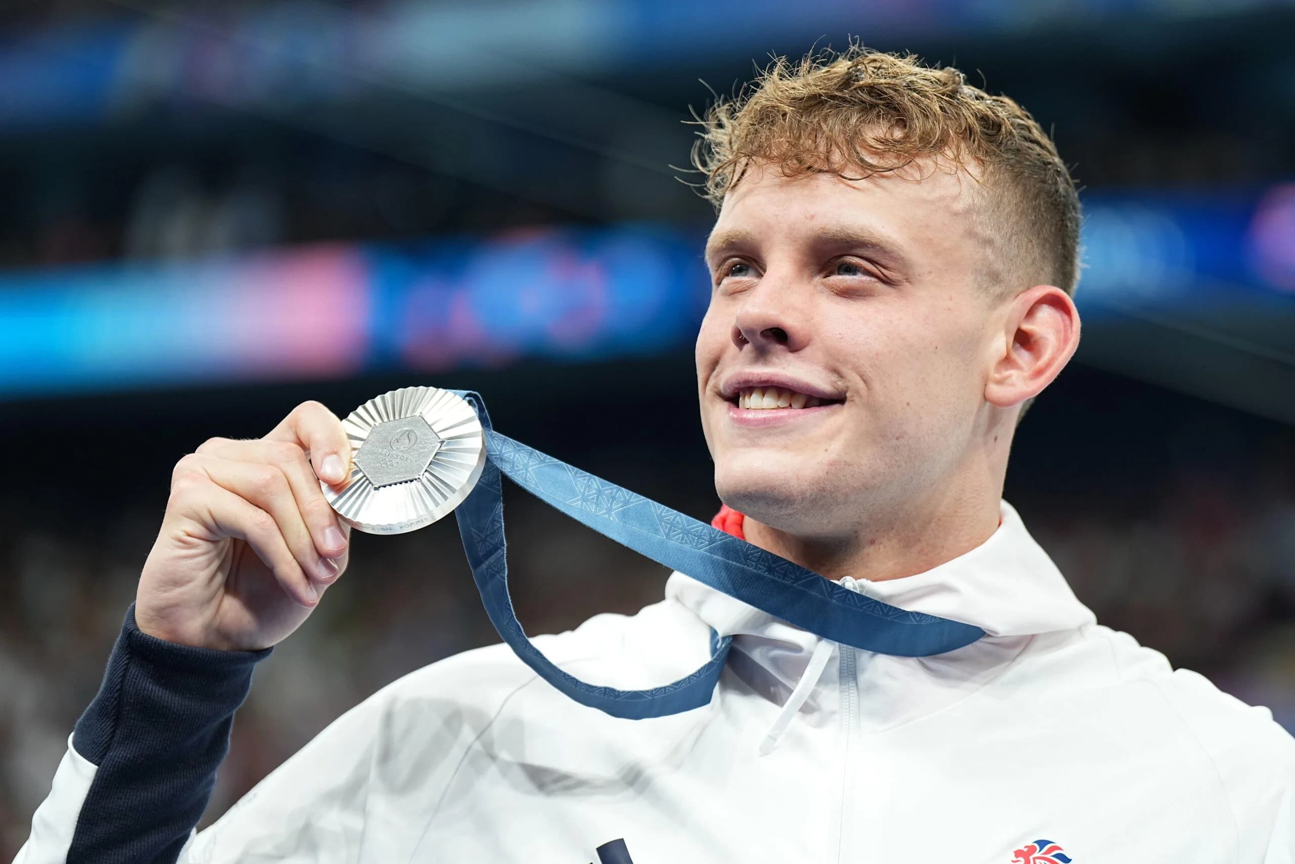 Matt Richards from Great Britain celebrates with his silver medal. Credit: Michael Kappeler/dpa/Alamy Live News