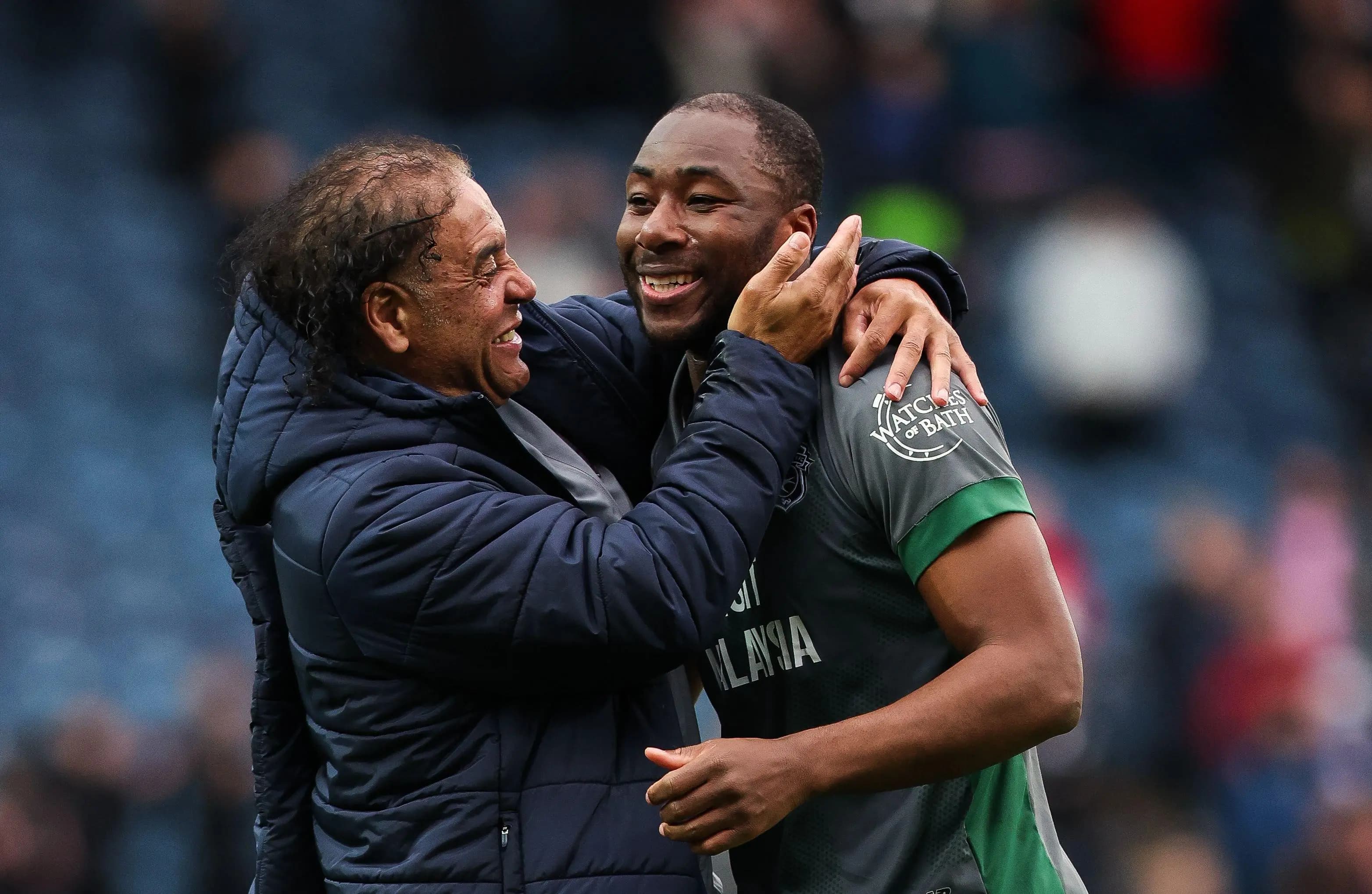 Cardiff City striker Yakou Meite celebrates with assistant coach Richard Shaw . Pic: Alamy