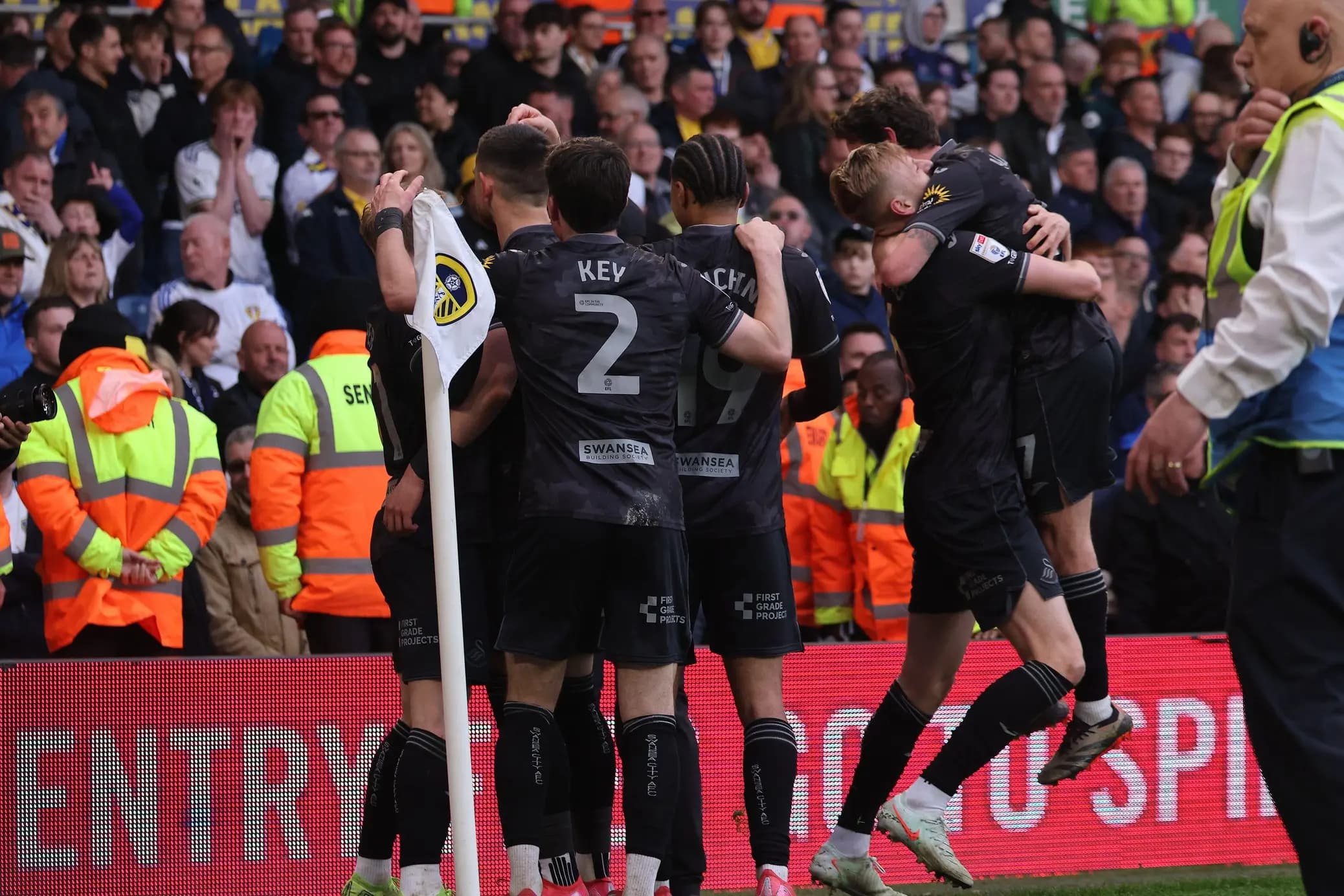 Joe Allen and his Swansea City teammates celebrate their late equaliser. Pic: Alamy