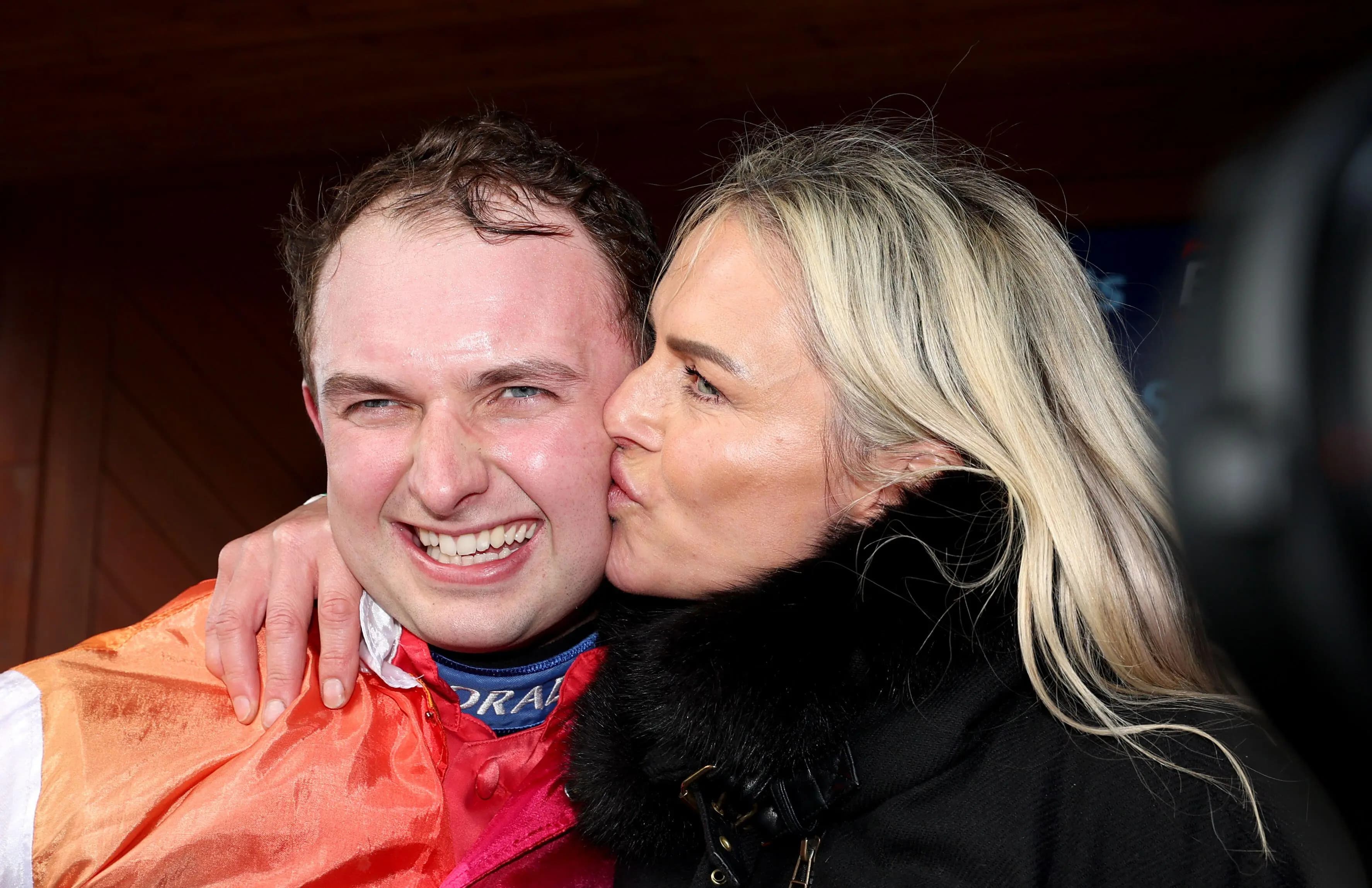 Jockey Sean Bowen gets a kiss from trainer Rebecca Curtis. Pic: Alamy