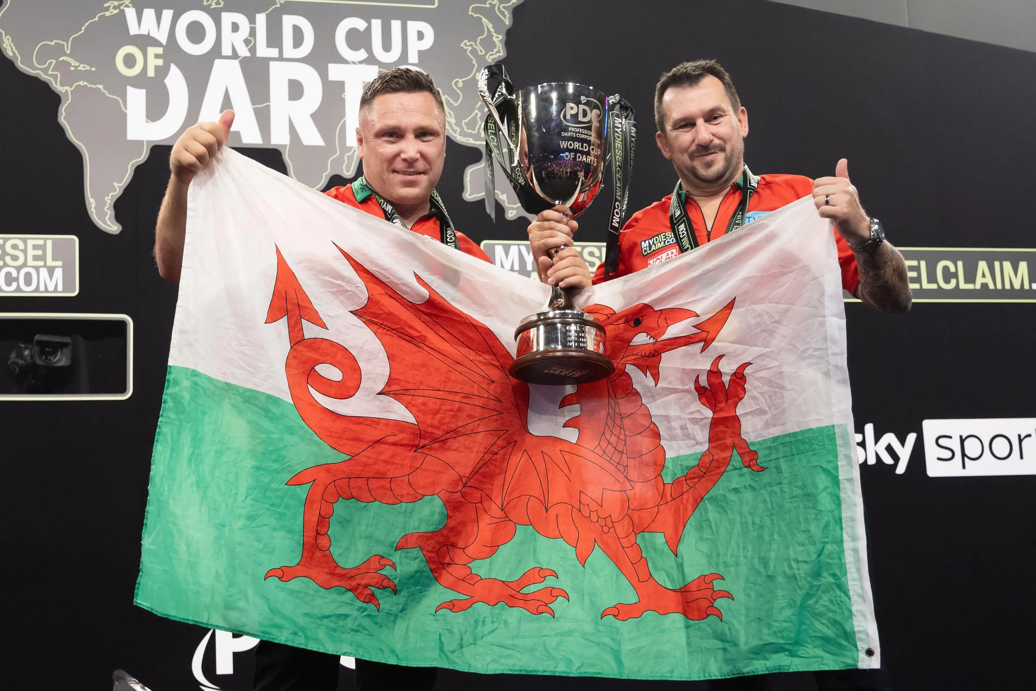 Gerwyn Price and Jonny Clayton celebrate their World Cup triumph in 2023. Pic: Alamy