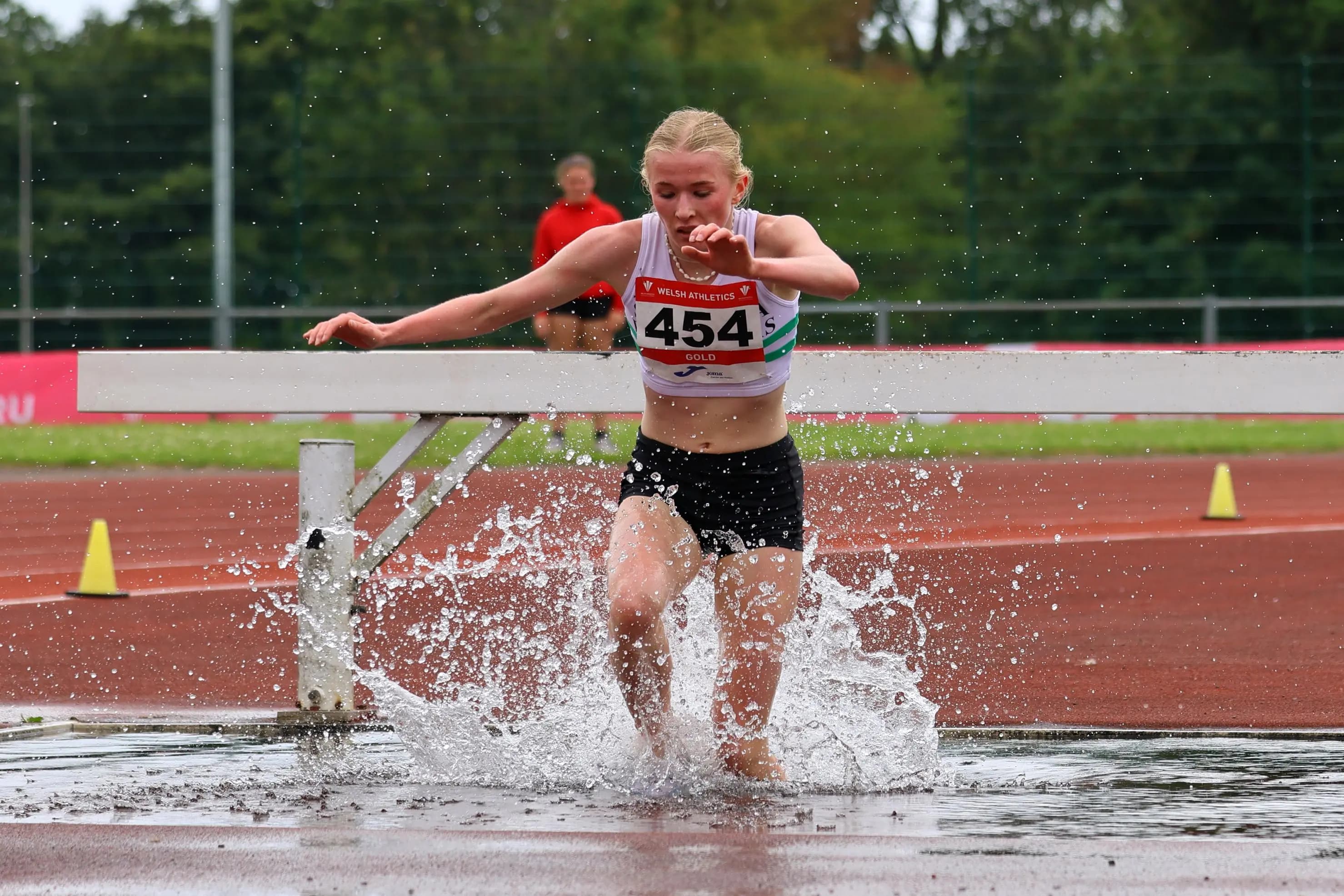 Millie Gold on her way to her record-breaking steeple chase victory in Swansea on Saturday.