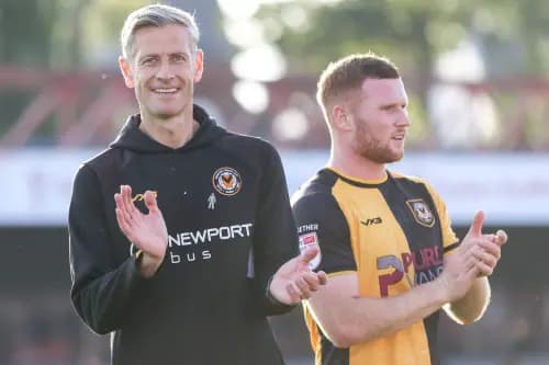 Newport County manager David Hughes (left) and defender Lee Jenkins. Pic: Alamy
