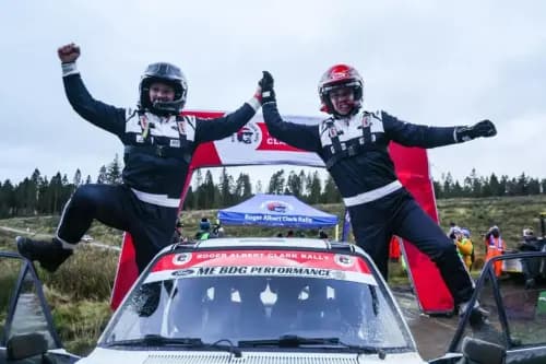 Osian Pryce (right) and co-driver Dale Furniss celebrate their victory. Pic: Nigel Pratt, Black Mountains Media