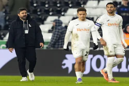 Vitor Matos shouts to his dejected looking players, Manuel Benson and Ben Cabango. Pic: Alamy