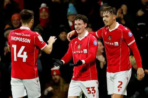 Wrexham's Nathan Broadhead (centre). Pic. Alamy