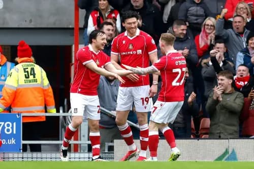 Wrexham's Kieffer Moore (centre). Pic. Alamy