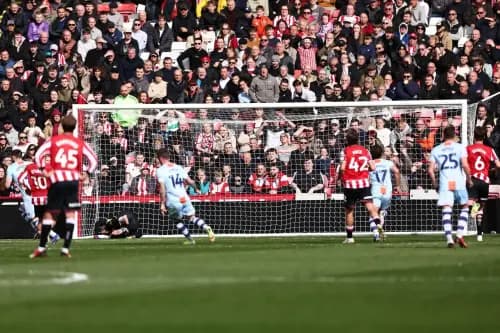 Zan Vipotnik (far left) scores for Swansea City. Pic. Alamy