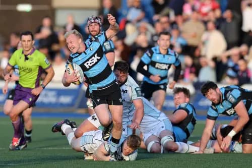 Johan Muller of Cardiff makes a break against the Ospreys. Pic: Alamy